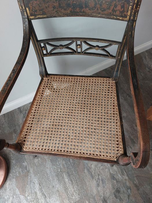 Close-up detail of hand-caned chair seat showing fine 2mm cane weave and 4mm cane edging